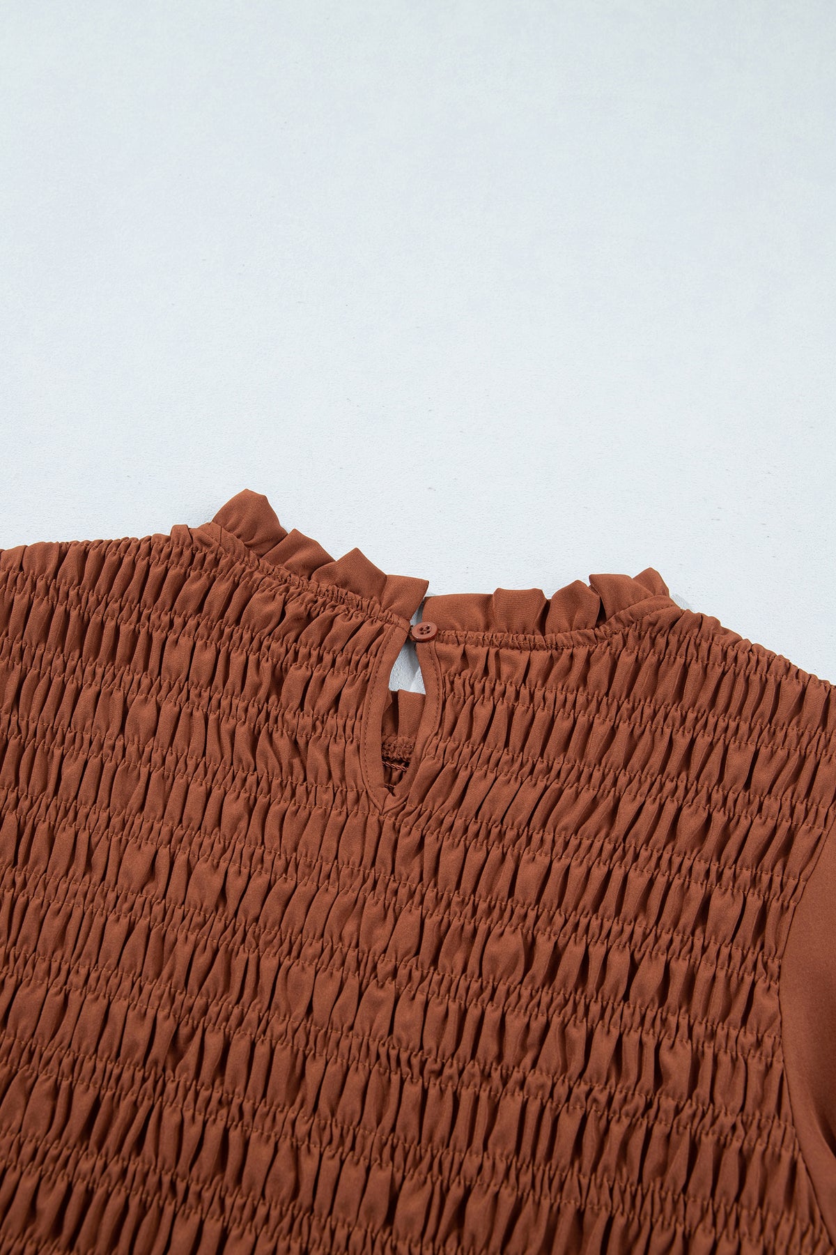 Jet Stream Solid Color Smocked Ruffle Hem Long Sleeve Blouse